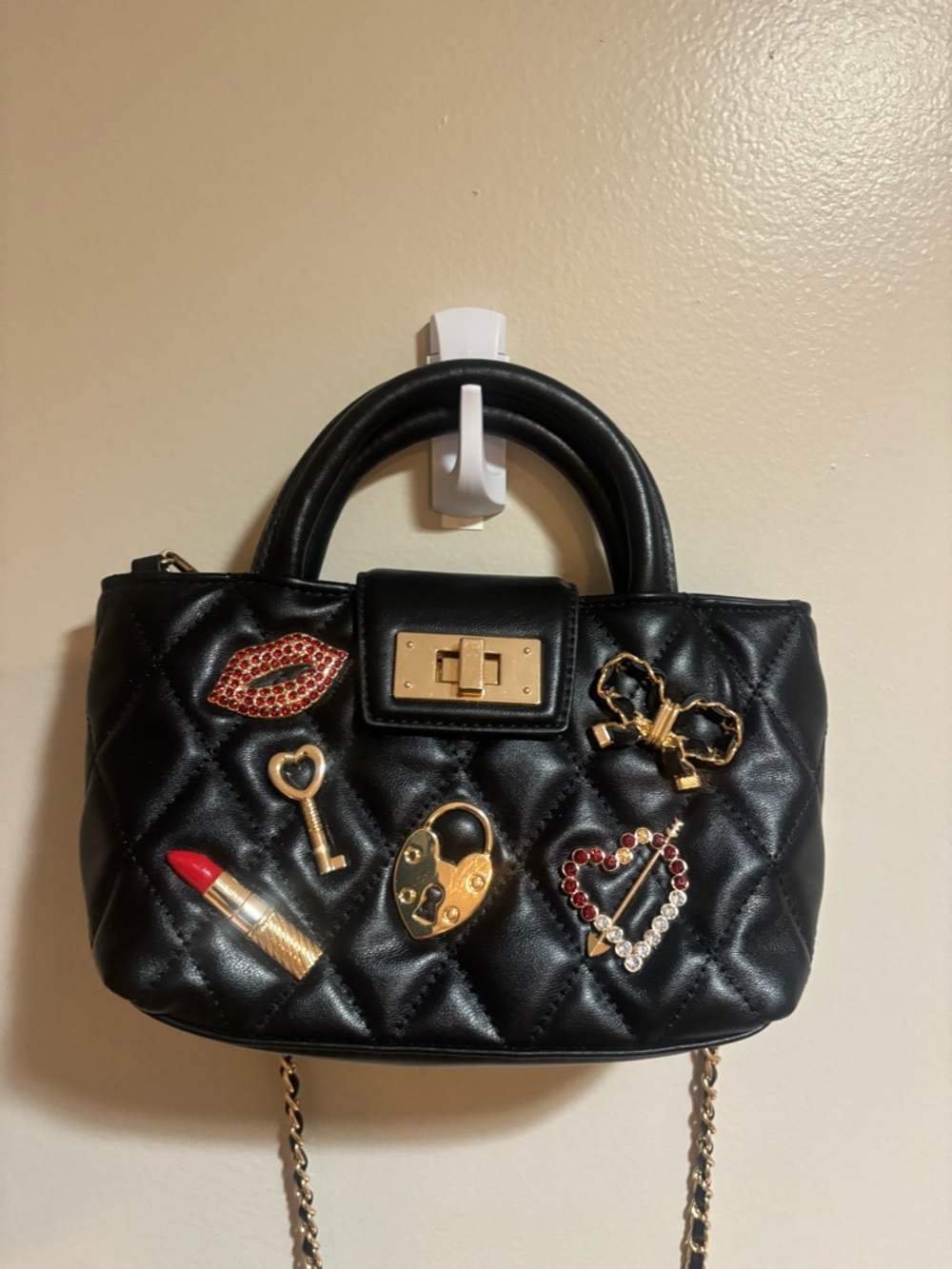 Aldo Black Quilted Mini Satchel with Gold Hardware and Red Accents